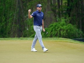 Corey Conners reacts to a made putt on the second green during the second round of the PGA Championship at Rochester on Friday.