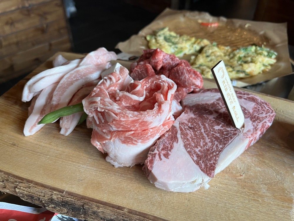 Meats to be cooked on the tabletop grill at Daldongnae Korean BBQ on Somerset Street West, including, from left to right, pork jowl, thinly sliced pork belly, boneless beef short rib and Wagyu ribeye
