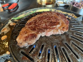 A Wagyu ribeye steak at Daldongnae Korean BBQ on Somerset Street West