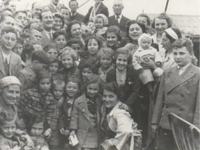 Children are shown on the deck of the MS St. Louis in this undated handout photo. Canada decided in 1939 to turn away a steamship carrying more than 900 Jewish refugees fleeing Nazi Germany. The MS St. Louis was forced to sail back to Europe, where about 250 of its passengers later died in the Holocaust.