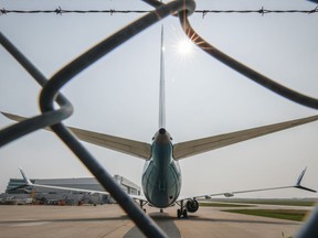A WestJet plane is shown at the Calgary International Airport in Calgary, Alta., Thursday, May 18, 2023.