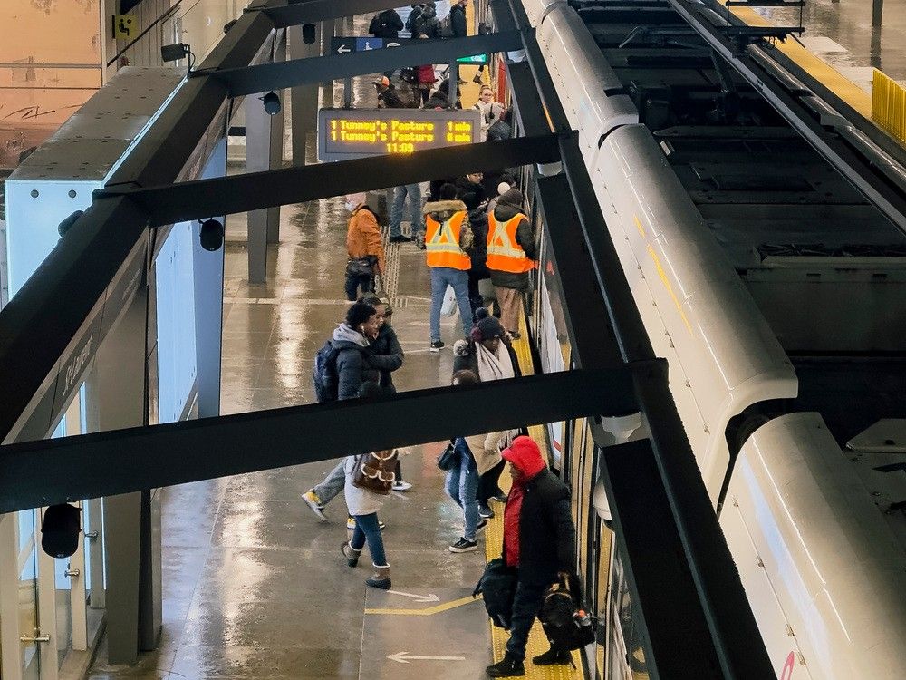 A file photo of riders boarding the LRT at St. Laurent Station.