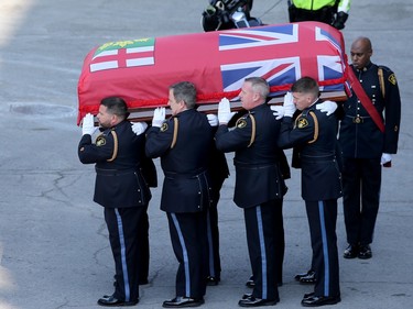 The casket carrying Sgt. Eric Mueller is carried by pallbearers into his funeral at the Canadian Tire Centre in Ottawa Thursday morning.
The police officer was killed when responding to a call in Bourget in the early-morning hours of May 11th, along with two other officers who were wounded at the same time. The funeral procession, which travelled from Rockland to Kanata, was expected to have about 9,000 police in attendance.