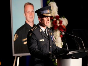 Ontario Provincial Police commissioner Thomas Carrique speaks during the funeral service of OPP Const. Grzegorz (Greg) Pierzchala in Barrie on Jan. 4, 2023.
