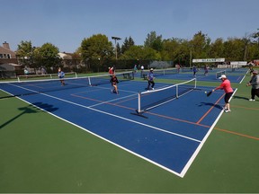 Pickleball players fill most of the courts at the Orléans Tennis Club.