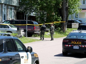 OPP officers were on the scene in Pembroke on Monday after a double homicide.