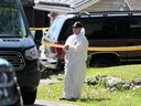 OPP investigators on the scene of a double homicide in Pembroke on May 22.