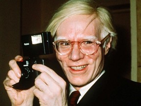 FILE - In this 1976 file photo, pop artist Andy Warhol smiles in New York. The Supreme Court on Thursday, May 18, 2023, sided with a photographer who claimed the late Andy Warhol had violated her copyright on a photograph of the singer Prince. The Supreme Court sided 7-2 with photographer Lynn Goldsmith. The case involved images Warhol created of Prince as part of a 1984 commission for Vanity Fair. Warhol used a Goldsmith photograph as his starting point.