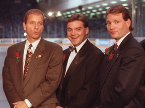 From left: Bruce Firestone, Randy Sexton and Cyrill Leader attend Ottawa Senators opening night in 2004.