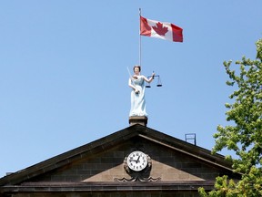 statue of Sally Grant atop the Brockville courthouse