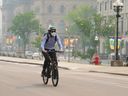 Smoke from wildfires in Ontario and Quebec drifted into Ottawa earlier this month, with cyclists downtown wearing masks due to the poor air quality.