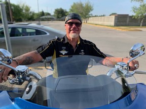 Ed Johner on motorcycle
