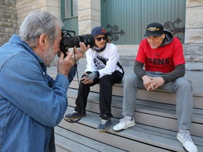 Crombie McNeill, shown here with Alex Hayes, left, and René Ruest, has intermittently shot portraits of homeless people in Ottawa since 1965.