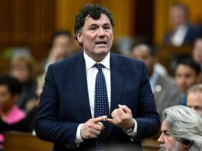 Minister of Intergovernmental Affairs, Infrastructure and Communities Dominic LeBlanc rises during Question Period in the House of Commons on Parliament Hill in Ottawa on Monday, March 27, 2023.