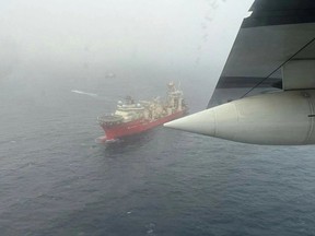 A U.S. Coast Guard ship and plane