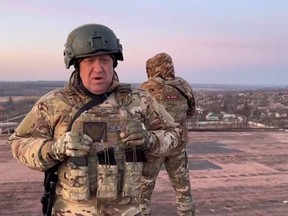 This video grab taken from a video posted on Telegram channel @concordgroup_official on March 3, 2023, shows Yevgeny Prigozhin, the chief of the Russian paramilitary group Wagner speaking to the camera from a rooftop at an undisclosed location. Prigozhin declared his fighters have "practically encircled" Bakhmut.