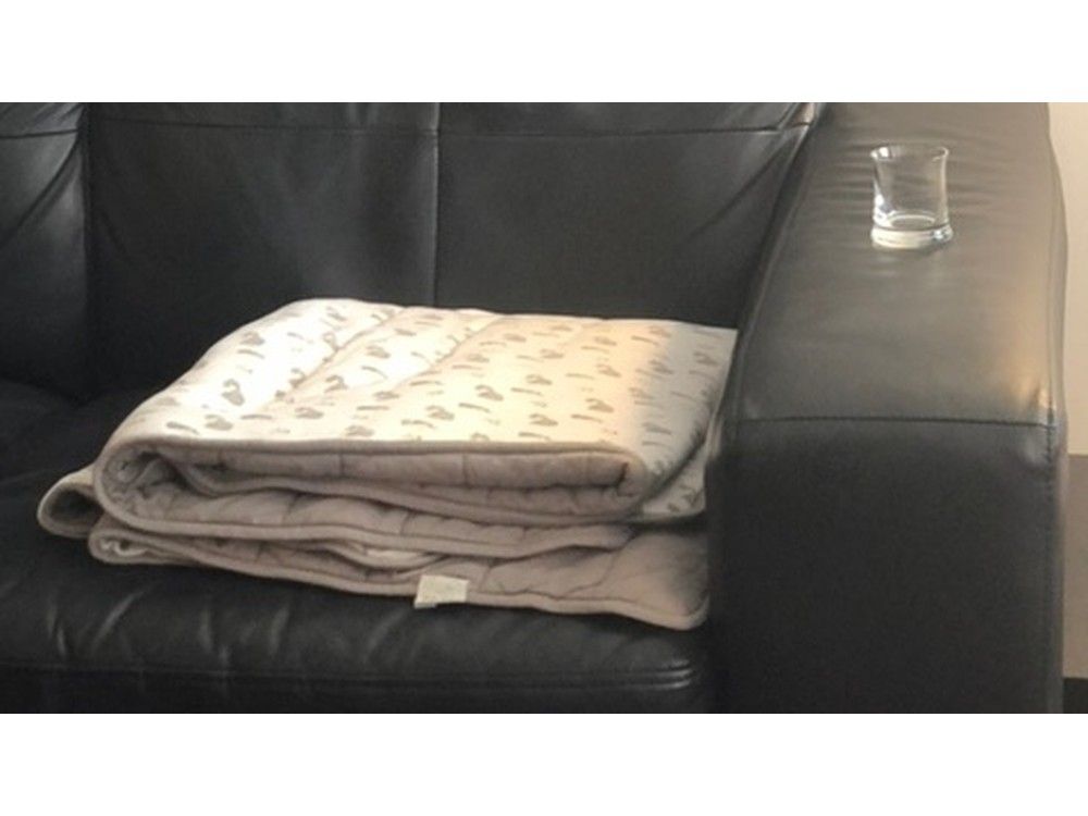 Dessaulles texted his client this picture of a blanket next to an empty shot glass.