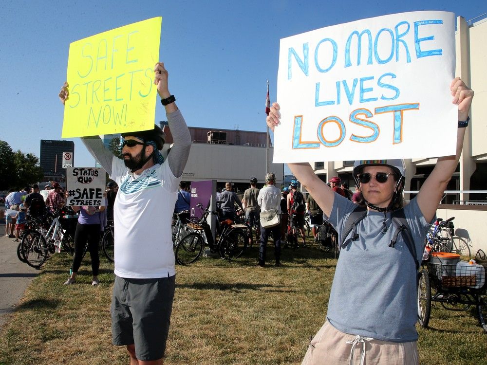 About 100 cyclists and others gathered Thursday morning at the intersection of Somerset and Gladstone to demand safer streets for bikes and pedestrians. 