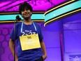 Speller Dev Shah of Largo, Florida, participates in a final round of the 2023 Scripps National Spelling Bee at Gaylord National Hotel and Convention Center on June 1, 2023 in National Harbor, Maryland.
