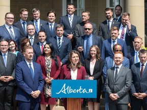 Alberta Premier Danielle Smith holds a press conference with her new cabinet ministers in Edmonton on Friday, June 9, 2023.