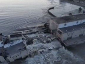 This image made from video provided by Ukraine's Presidential Office shows the damaged Kakhovka dam near Kherson, Ukraine, Tuesday, June 6, 2023.