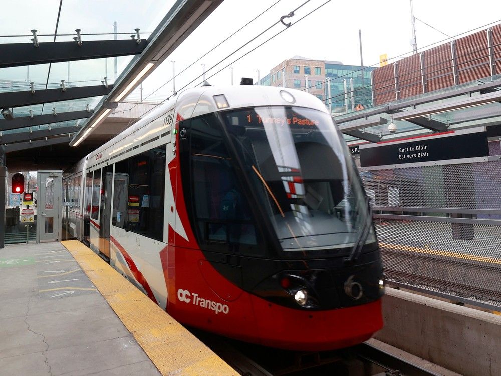 Commuters taking the LRT in Ottawa. OC Transpo is getting ready to test a pay system which will allow riders to pay their transit fares using a credit card or mobile wallet.