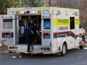 A paramedic climbs into an ambulance at Hôpital Montfort. File photo