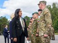 Then-defence minister Anita Anand, left, meets the Canada-led multinational NATO enhanced Forward Presence Battle Group at the Adazi military base in Riga, Latvia, on July 10.