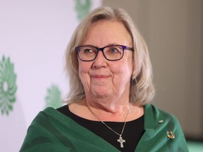 FILE: Green Party Leader Elizabeth May stands on stage before the new leader of the Green Party is chosen in Ottawa on Saturday, November 19, 2022.