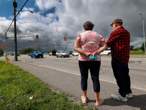 OTTAWA - July 21, 2023 - The mother and step-father of the 26-year-old woman who died after being hit by an OC Transpo bus on Thursday, July 20, 2023, visited the scene of the crash Friday morning, trying to understand what happened to their daughter. They didn't wish to be identified, as family members of the victim have yet to be notified. TONY CALDWELL, Postmedia.