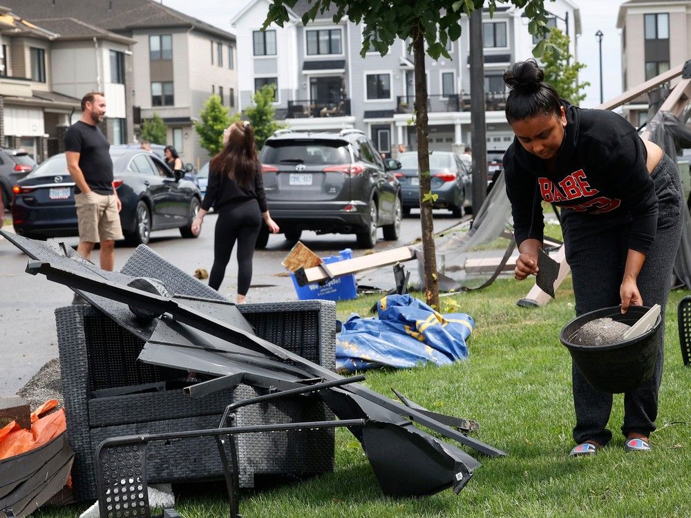 Families go outside their home near Merak Park