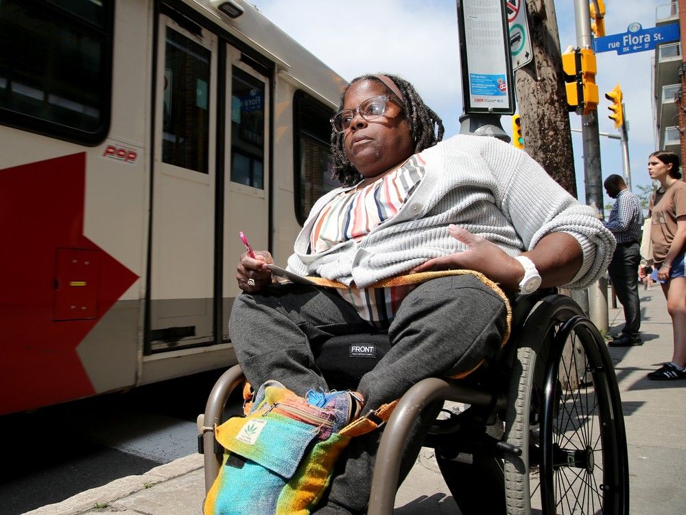 Sally Thomas, seen here at her local bus stop on Bank Street downtown,  is happy the LRT is coming back on Monday because it will take pressure off Para Transpo for users like herself. However, she says she will also be able to take the regular OC Transpo more often because buses will be less crowded.