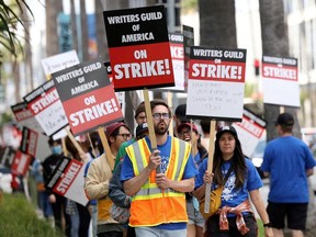Writers Guild of America members and supporters picket