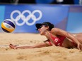 Melissa Humana-Paredes, of Canada digs out the ball during a women's beach volleyball match against Spain at the 2020 Summer Olympics, Monday, Aug. 2, 2021, in Tokyo, Japan.