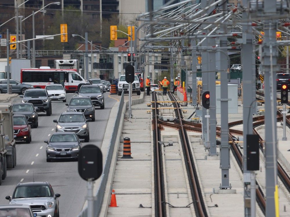 Workers are seen at the Bermondsey Road and Sloane Avenue station of the Eglinton Crosstown project. The yet-to-be-opened project is now in its 11th year.