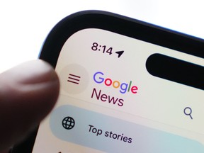 phone showing Google News