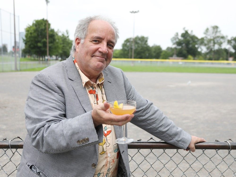 Bruce Deachman savours a cocktail at an Ottawa park recently. 