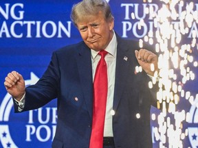 Former U.S. President and 2024 presidential hopeful Donald Trump gestures after speaking at the Turning Point Action USA conference in West Palm Beach, Florida, on July 15, 2023.