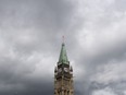 Storm clouds pass by the Peace tower and Parliament hill Tuesday August 18, 2020 in Ottawa.