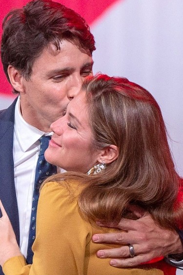 Liberal leader Justin Trudeau celebrates with his wife, Sophie Gregoire, after winning a minority government at the election night headquarters October 22, 2019 in Montreal.