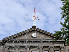 The Brockville courthouse is seen through the spray of the Court House Green fountain on Thursday, Aug. 17, 2023. (RONALD ZAJAC/The Recorder and Times)