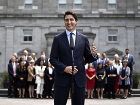 Prime Minister Justin Trudeau is set to deliver a new mission for his cabinet at a three-day retreat in Charlottetown this week in a bid to restore a sense of economic security for Canadians and more confidence from Canadians in his government.&ampnbsp;Trudeau gestures towards the federal cabinet as they stand behind him at a media availability after a cabinet shuffle, at Rideau Hall in Ottawa, on Wednesday, July 26, 2023.