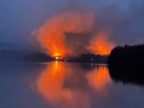 A wildfire burns near Centennial Lake