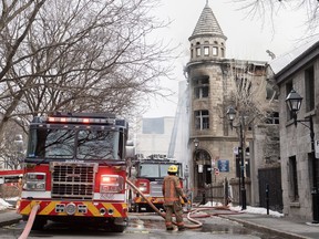 A lawyer representing the father of a man killed in a fire in Old Montreal in March says an announcement by police that the fire was criminal raises new questions for her client. A firefighter is shown at the scene of a fire in Old Montreal, Thursday, March 16, 2023.