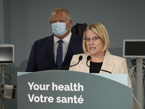 Ontario Health Minister Sylvia Jones says the province will be offering funding to public health units that want to merge and will reverse cuts to a funding formula.&ampnbsp;Jones makes an announcement on healthcare with Premier Doug Ford in the province in Toronto, Monday, Jan. 16, 2023.