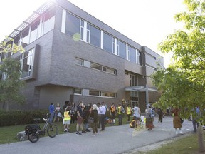 A community event takes place outside Hagey Hall at the University of Waterloo in Waterloo, Ont., on Thursday, June 29, 2023.