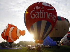 File photo: September 3, 2010. Dozens of balloons puffed up in the morning air at Jacques-Cartier Park.