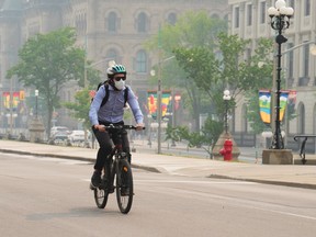 cyclist with smoke mask