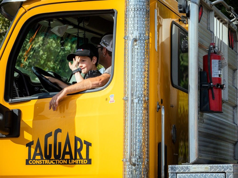 The heavy equipment and large trucks were shined right up to show off for all the children that lined the parade route around CHEO Saturday. The National Capital Heavy Construction Association and the Ottawa Construction Community came together to put on a spectacular display of their equipment all while making a $30,000 donation to the CHEO Foundation. The children were filled with excitement and the horns honked and the special characters and teddybears waved from the huge vehicles moving past Roger Neilson House and CHEO. 