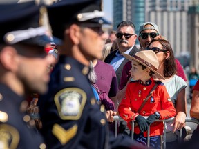 Seven-year-old Jacob Roush-Said dressed in an RCMP outfit at the Canadian Police and Peace Officers' 46th annual memorial service on Parliament Hill
